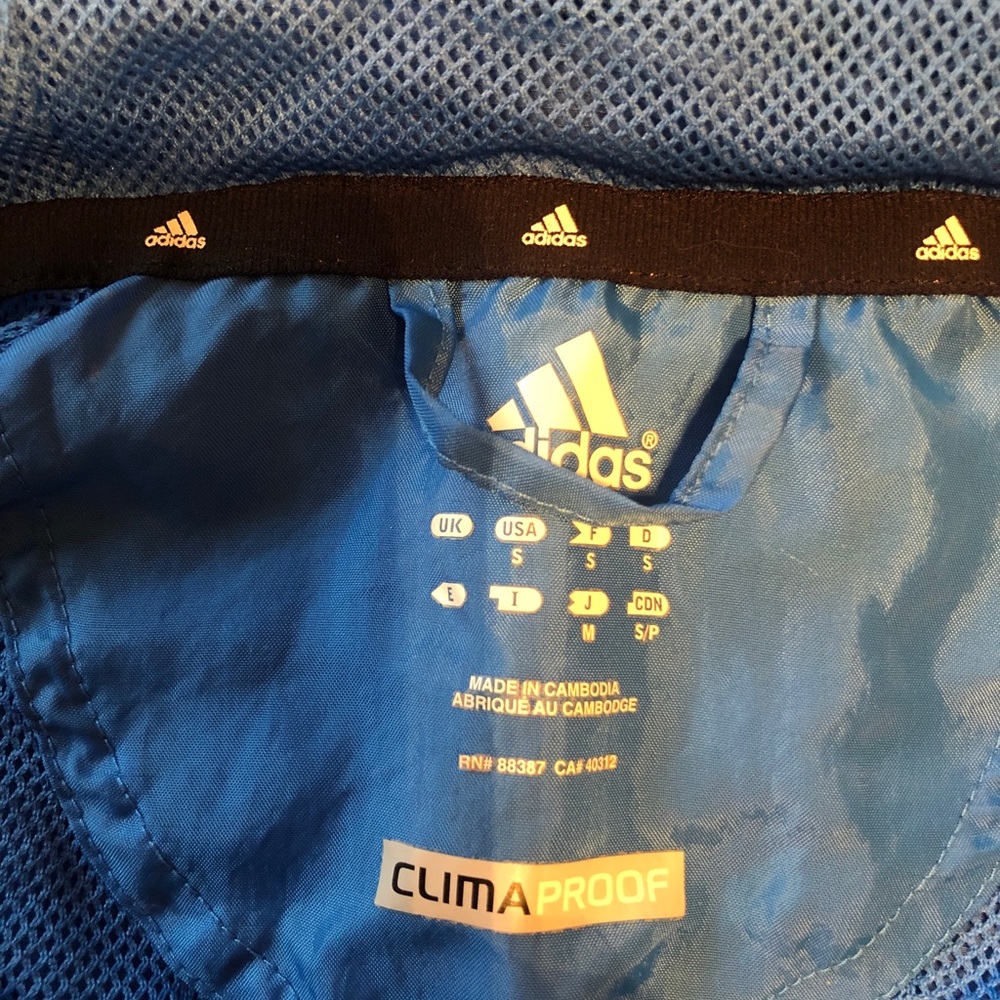 Blue Adidas rain coat